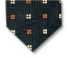 Gravata Cravatterie Internazionali trabalhada na cor verde com detalhes laranja e amarelo.
